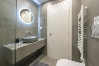 a bathroom with a sink and a mirror at Zografou Urban Apartments, A2Zen in Athens