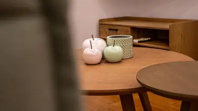 a table with two vases on top of it at Zeas Yacht View in Piraeus