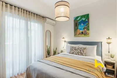 a bedroom with a bed and a large window at Modern Studio Escape near Seaside & Marina! in Athens