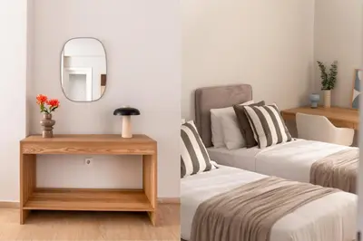 a bedroom with two beds and a mirror at Chalandri Bright 2BR Apartment by UPSTREET in Athens