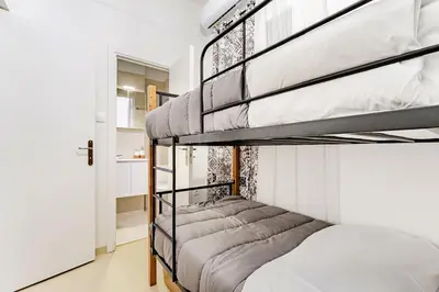 a bunk bed room with two bunk beds at Boutique 5BDT-3 ΒATH Apt with Eclectic Style- Acropolis in Athens