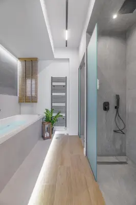 a bathroom with a large tub and a shower at 50 Shades of Athens, Kingsize Suite with Jacuzzi! in Athens