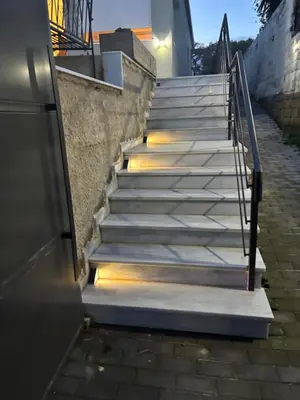 a set of stairs with lights on them at Athens Air B&B in Athens