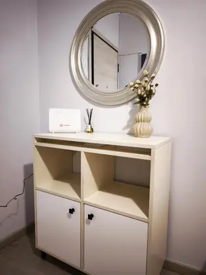 a dressing table with a mirror on top of it at Urban Piraeus Studio 200m from Neo Faliro Station in Piraeus