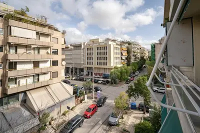 a view of a city street with cars and buildings at Nea Smyrni 1 BDRM - Links To City Center by ΜΡS in Athens