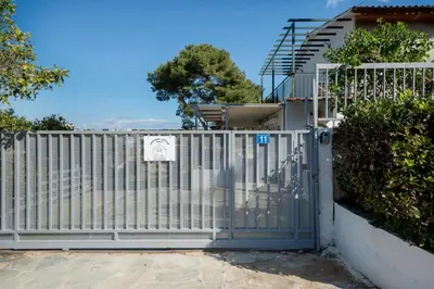a gate in front of a house at Livingstone House in Porto Rafti