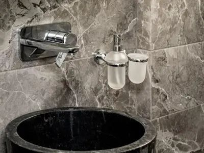 a bathroom with a sink and a faucet at Apartment Athen von unserem Haus aus- wenige Schritte von der Akropolis entfernt by Interhome in Athens