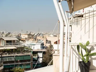 a view of a city from the balcony of a building at Apartment Athen von unserem Haus aus- wenige Schritte von der Akropolis entfernt by Interhome in Athens