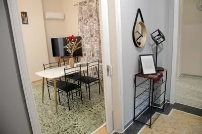 a dining room with a table and chairs at Casa Urbana in Athens