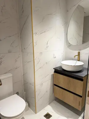 a bathroom with a sink and a toilet at Paula Acropolis Thissio in Athens