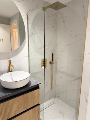 a bathroom with a sink and a shower at Paula Acropolis Thissio in Athens