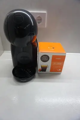 a coffee maker and a box on a counter at City Heart Luxury Boutique Suites in Athens