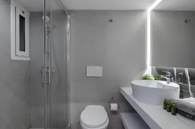 a bathroom with a shower and a toilet and a sink at New Korinis 3 Athens studio in Athens