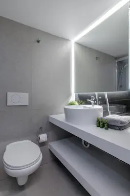 a bathroom with a white toilet and a sink at New Korinis 3 Athens studio in Athens