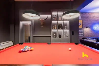 a billiard room with a pool table in it at Unique Urban Cave w Pool Table Near Acropolis! in Athens