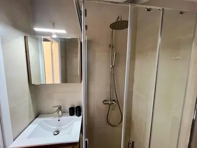 a bathroom with a shower and a sink at Carlo's Apartment in Athens