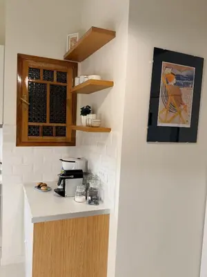 a kitchen with a counter and a counter top at BLU apartment Piraeus Marina Zeas in Piraeus
