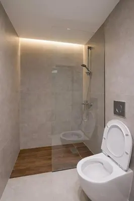 a bathroom with a toilet and a shower at Piraeus Port Luxury Suites No3 in Piraeus