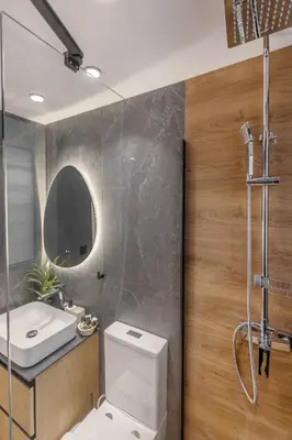 a bathroom with a toilet and a sink and a shower at Athens Vibes in Kipseli in Athens