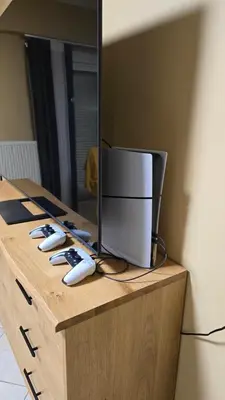 a desk with a computer monitor and a mirror at Dramas17 - PS5 in Piraeus