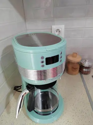 a blue mixer sitting on top of a counter at Tranquil Athenian Home - City Center in Athens
