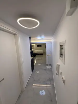 a room with a hallway with at City Center Dream Studio in Athens