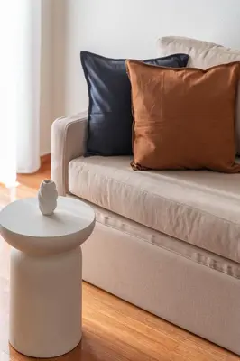 a living room with a couch and a table at Comfort Living 3BR Apartment in Chalandri by UPSTREET in Athens
