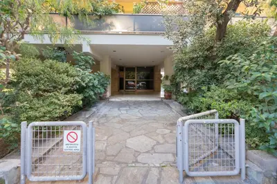 a no entry sign in front of a building at Comfort Living 3BR Apartment in Chalandri by UPSTREET in Athens