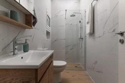 a bathroom with a sink and a toilet and a shower at Athens Urban Vibes 2 Backyard Bliss Patio in Athens