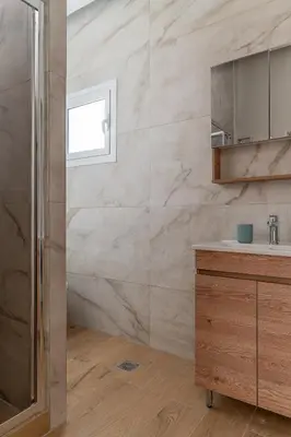 a bathroom with a sink and a mirror at Athens Urban Vibes 3 Bright Front Apt Sunny in Athens