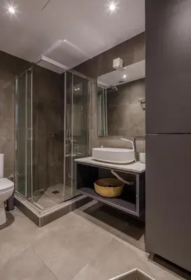 a bathroom with a shower and a sink and a tub at Cozy loft at Little Kook's alley, Psirry heart in Athens