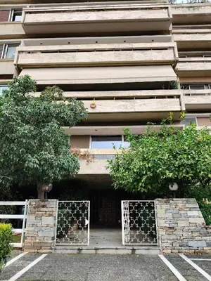 a building with two gates in front of it at A perfect place - close to Acropolis & Seacoast in Athens