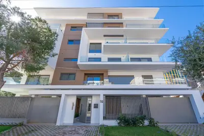 an apartment building with a white facade at M58 Pool Residence - Glyfada Central - Miltiadou 58 by K&M in Athens