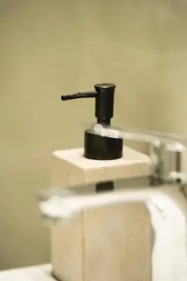a close up of a bathroom sink with a faucet at Cozy Gem in Athens in Athens