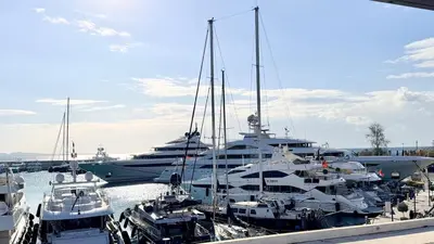 a bunch of boats docked in a harbor at Promenade Piraeus in Piraeus