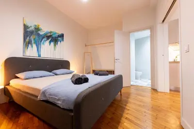 a bedroom with a large bed in a room at HeKo Collection Athens Center 1 in Athens