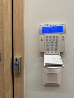 a fax machine with a laptop on a door at Boutique stylish studio near Dafni Metro in Athens