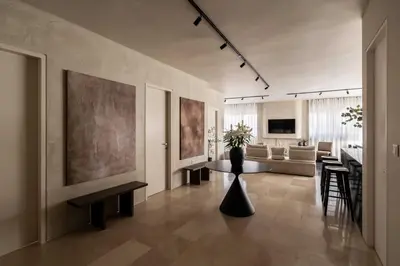 a living room with a table and a couch at ATELIER 57 , Stunning Acropolis View Monastiraki Apartment in Athens