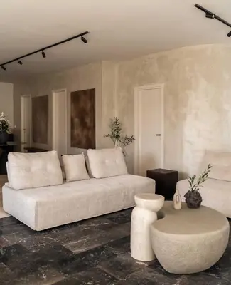 a living room with a white couch and a table at ATELIER 57 , Stunning Acropolis View Monastiraki Apartment in Athens