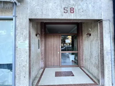 an entrance to a building with the number fifty six at Central Studio Near Uni & Parks - Zografou by ΜΡS in Athens