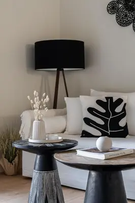a living room with a couch and a table at CALM South 19 in Athens