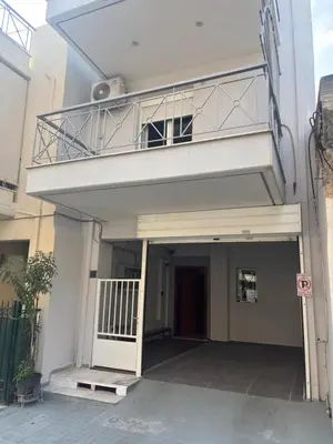 a balcony on the side of a building at Christoffer Mpournazi Penthouse in Athens