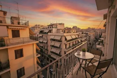 a view of a city from a balcony at Zwgrafou Deluxe For 4 Pers in Athens
