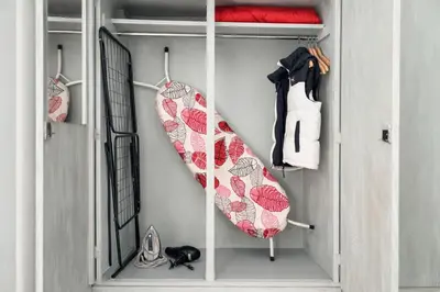 a walk in closet with a surfboard in it at Athens City Staying in Athens