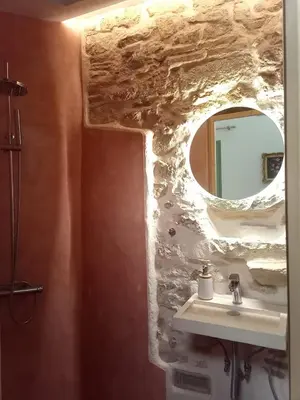 a bathroom with a sink and a mirror at The Fisherman's Romance in Piraeus