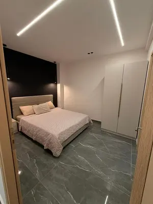a bedroom with a bed in a room at Monda Apartment 3 in Piraeus