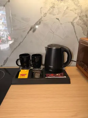 a tray with two coffee mugs on a table at Monda Apartment 3 in Piraeus
