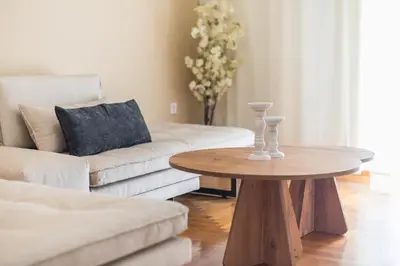 a living room with a couch and a table at Athena House Elegant Stay For Families By Greece Apartments in Athens