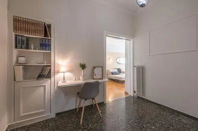 a home office with a desk and a chair at Athena House Elegant Stay For Families By Greece Apartments in Athens