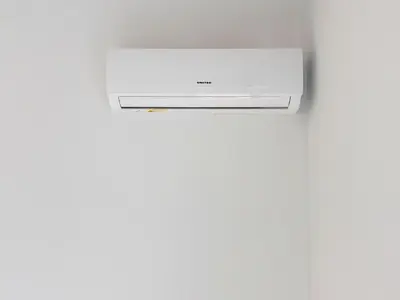 a white microwave oven sitting on top of a wall at Sunlit Retreat in Voula Center in Athens